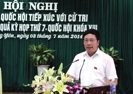 Вице-премьер СРВ Фам Бинь Минь встретился с избирателями провинции Куангнинь - ảnh 1